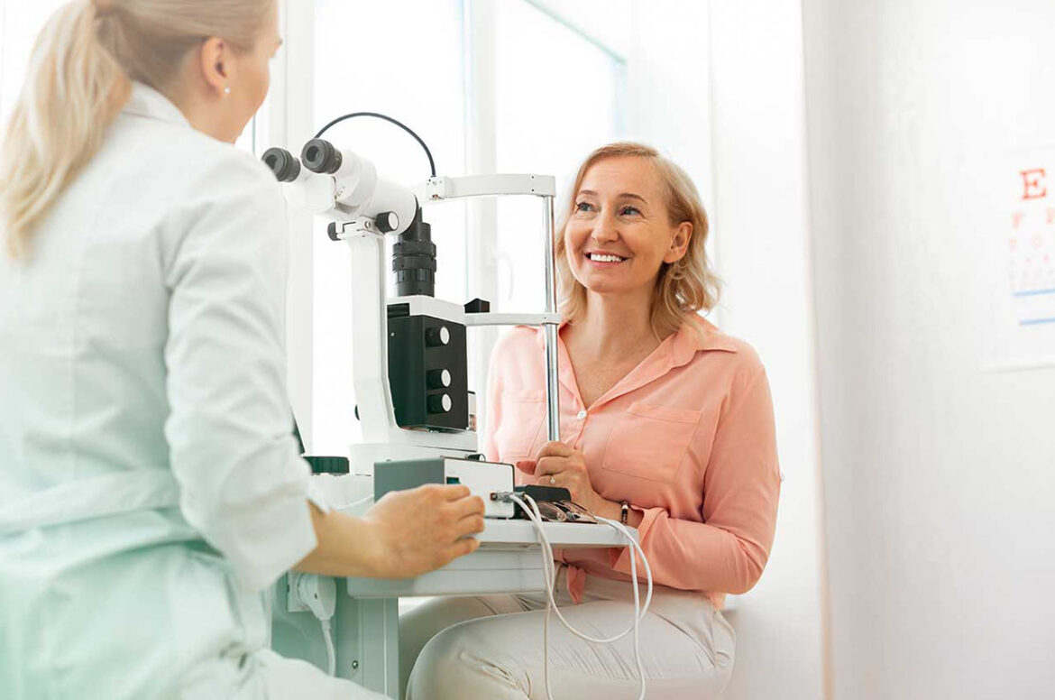 Doctor doing an eye exam on a patient at an optometry practice.